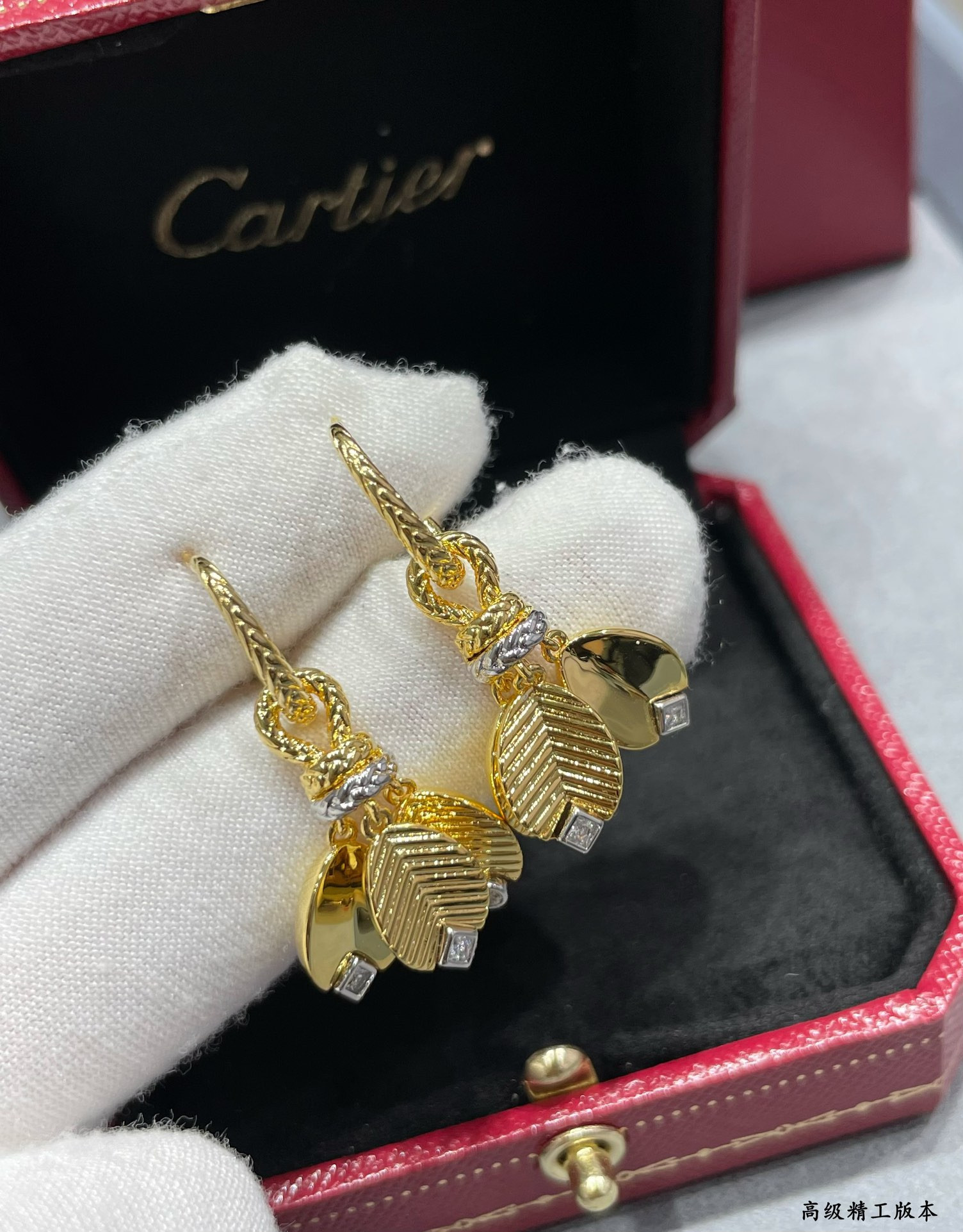 Ca*t*er coffee bean leaf earrings