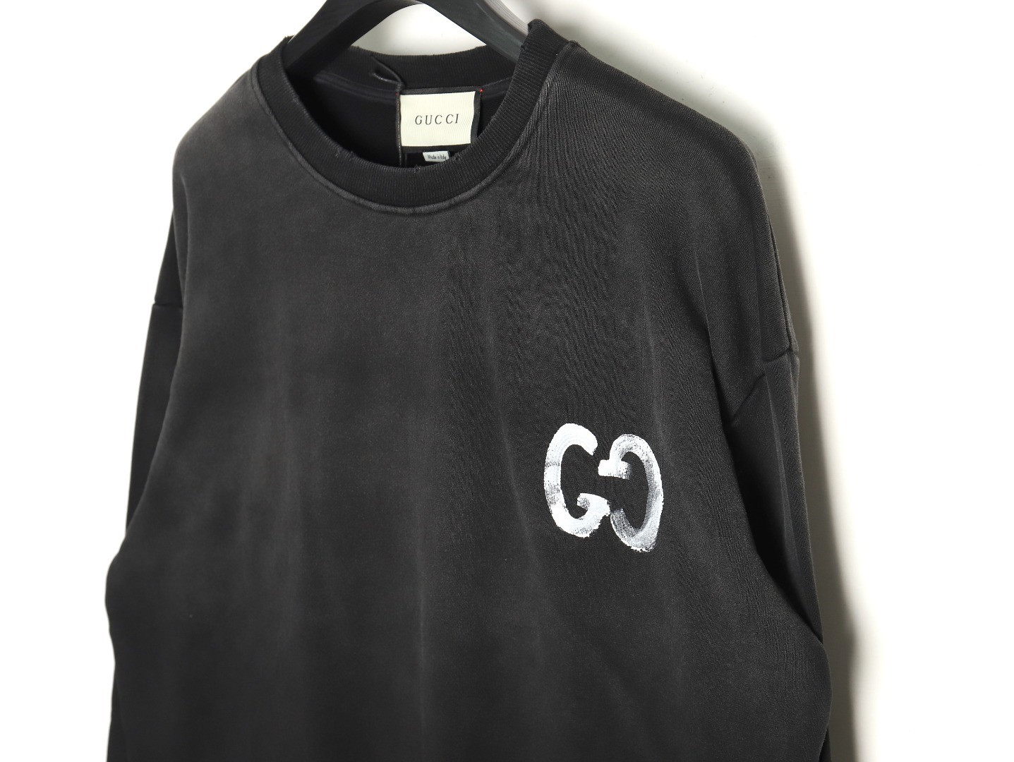 G*u*i hoodies