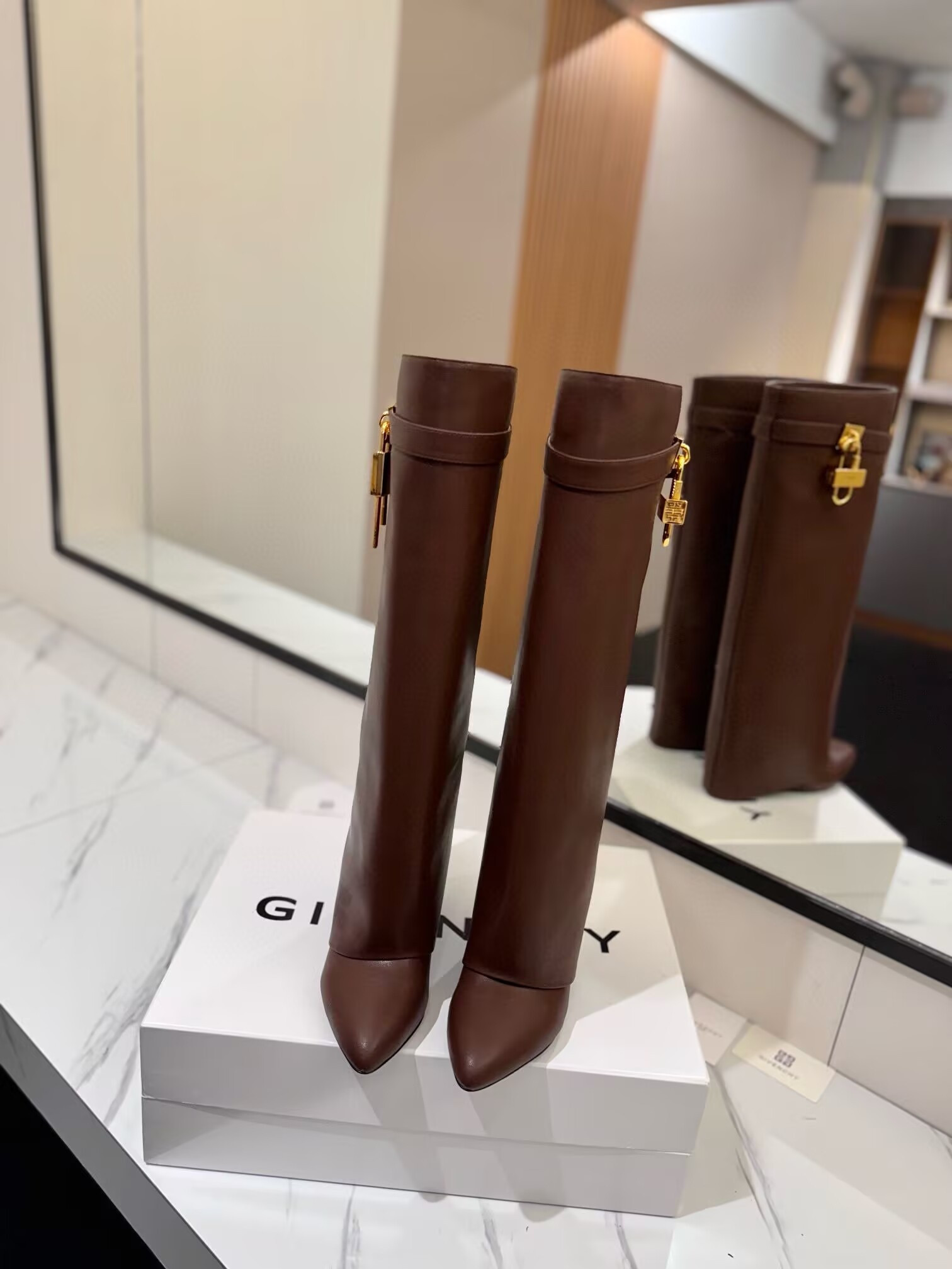 ua G1uenchy shark lock boots in leather