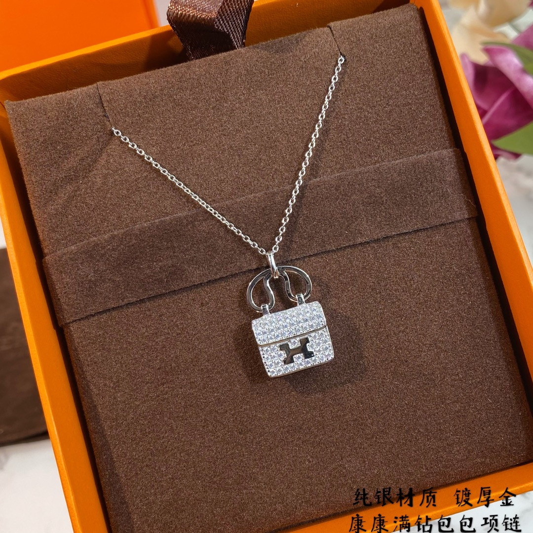 H**me5 fully di*m*nd-encrusted h bag necklace