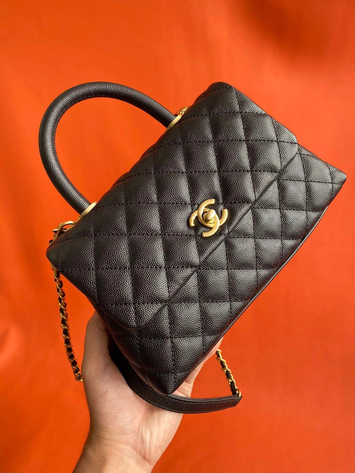 Ch*el flap bag with top handle
