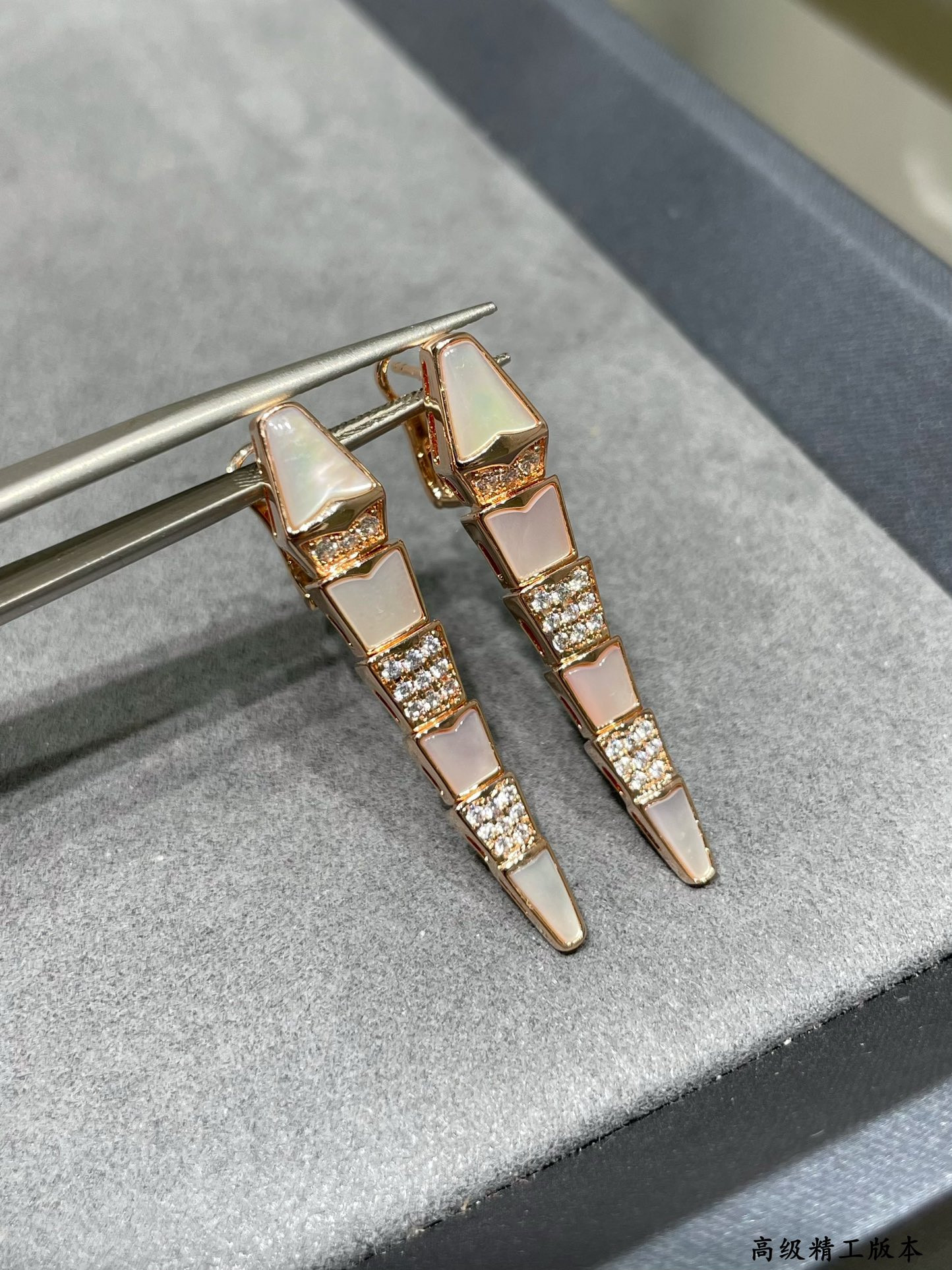 B*l*ai advanced mechanical shell snake earrings