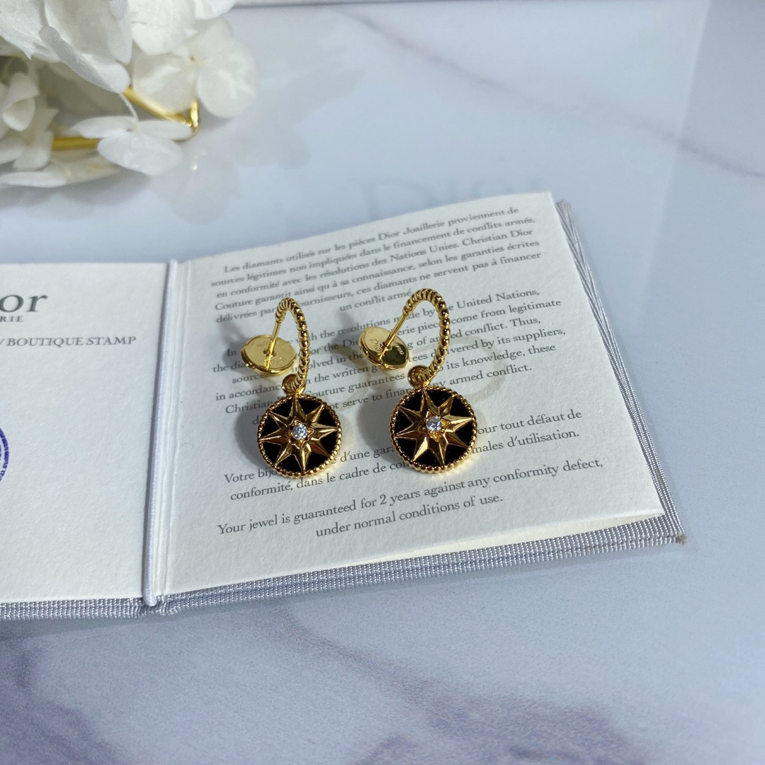 D*or eight-pointed star stud earrings