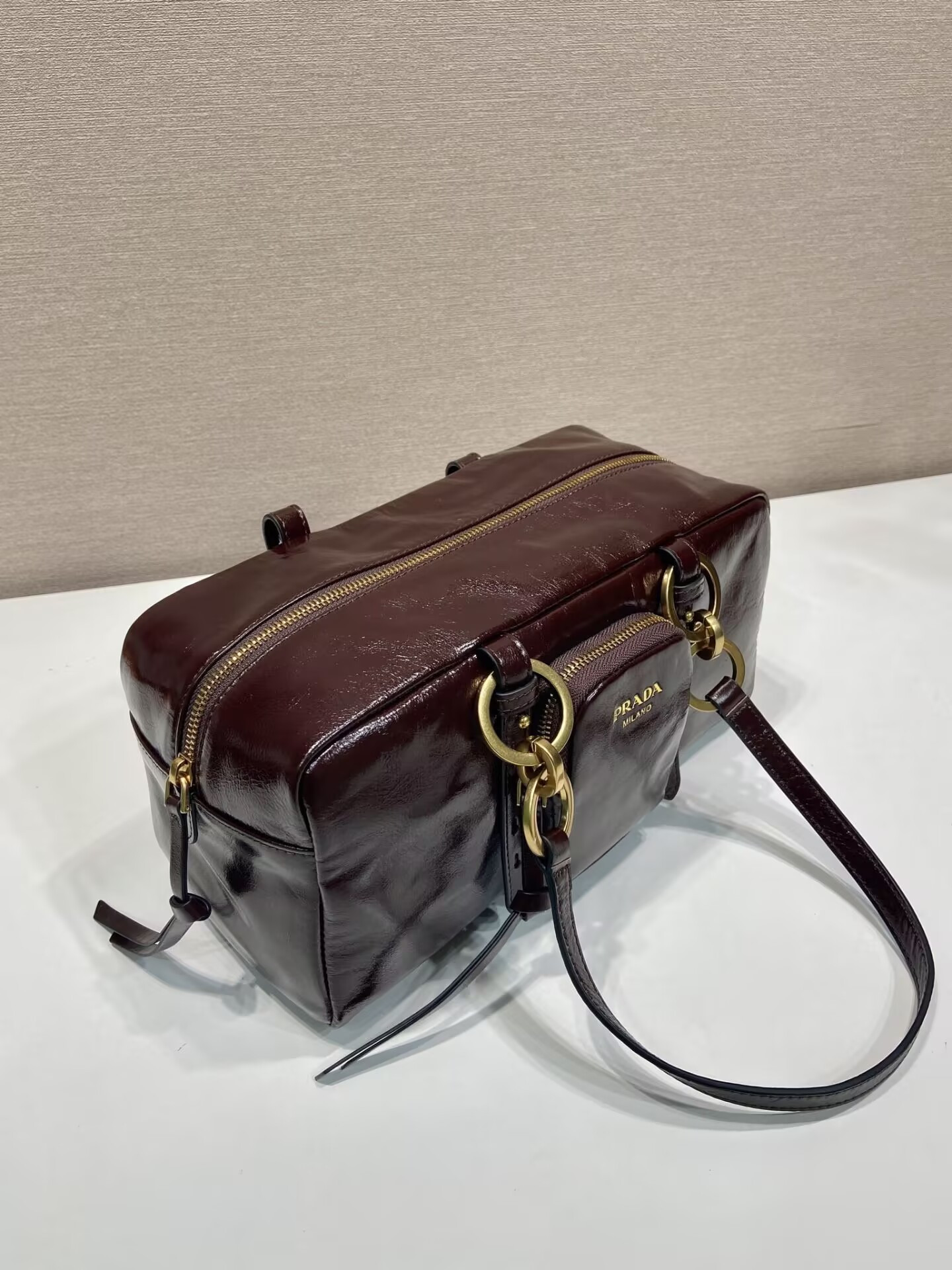 Pra*a dangle medium leather top-handle bag 14x30x13.5cm