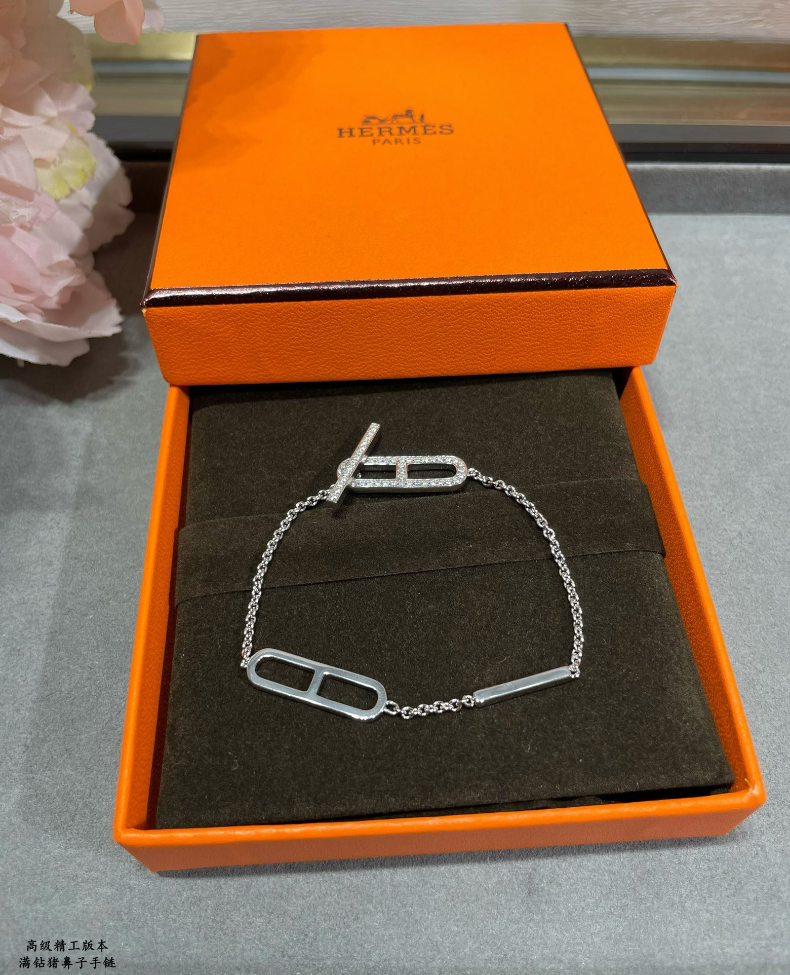 h**mes fully Di*m*nd-encrusted pig nose bracelet