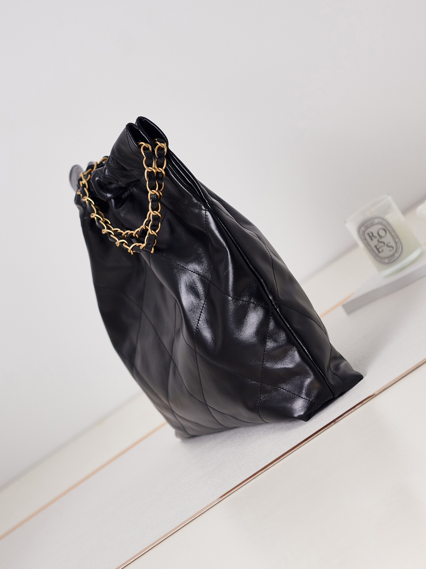 Ch*el 22 handbag shiny calfskin & gold-tone metal black 15.2×16.4×3.1 in