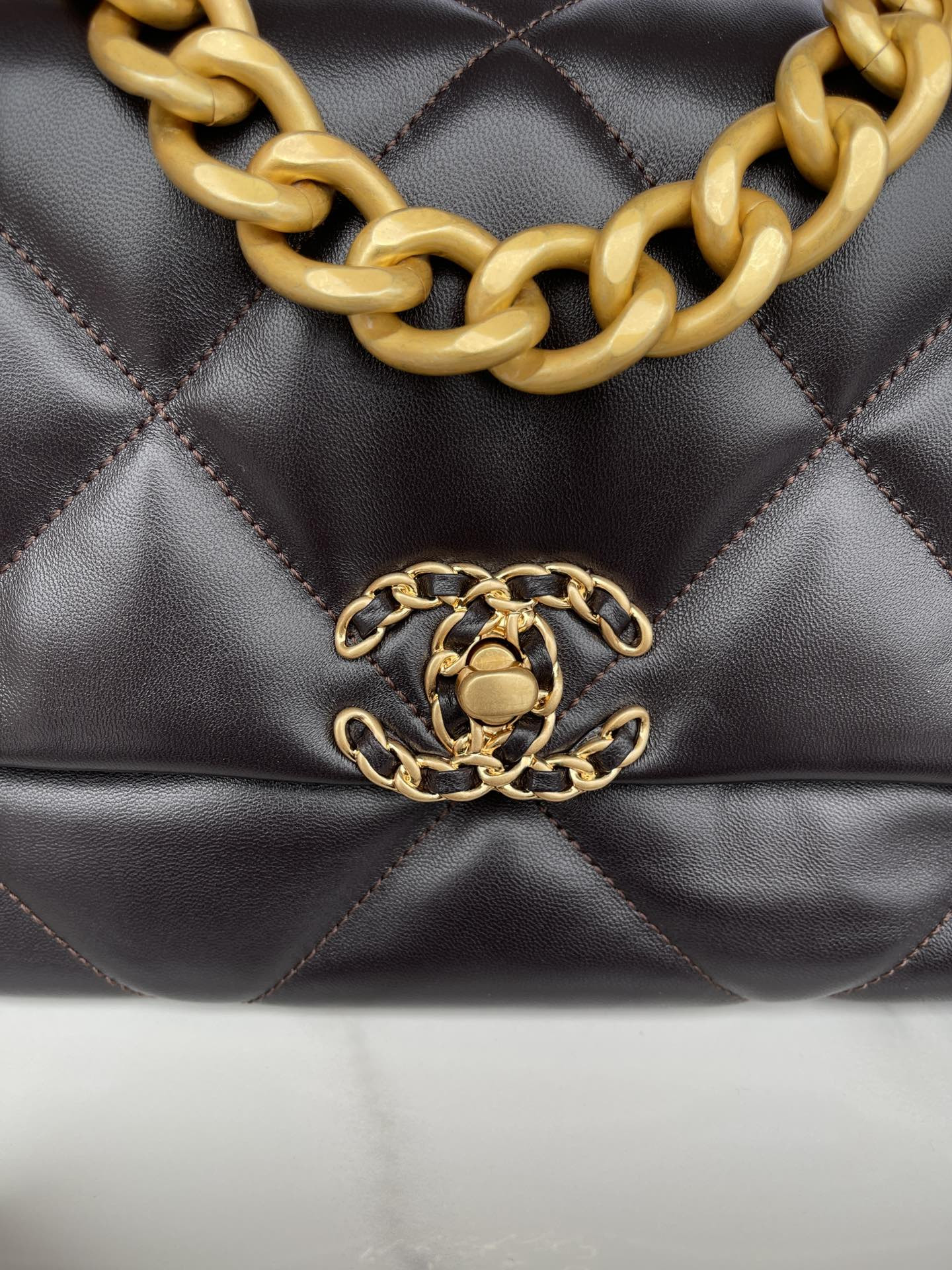 Ch*el 19 large handbag shiny leather, gold-tone, silver-tone & ruthenium-finish metal black 7.8 × 11.7 × 3.9 in