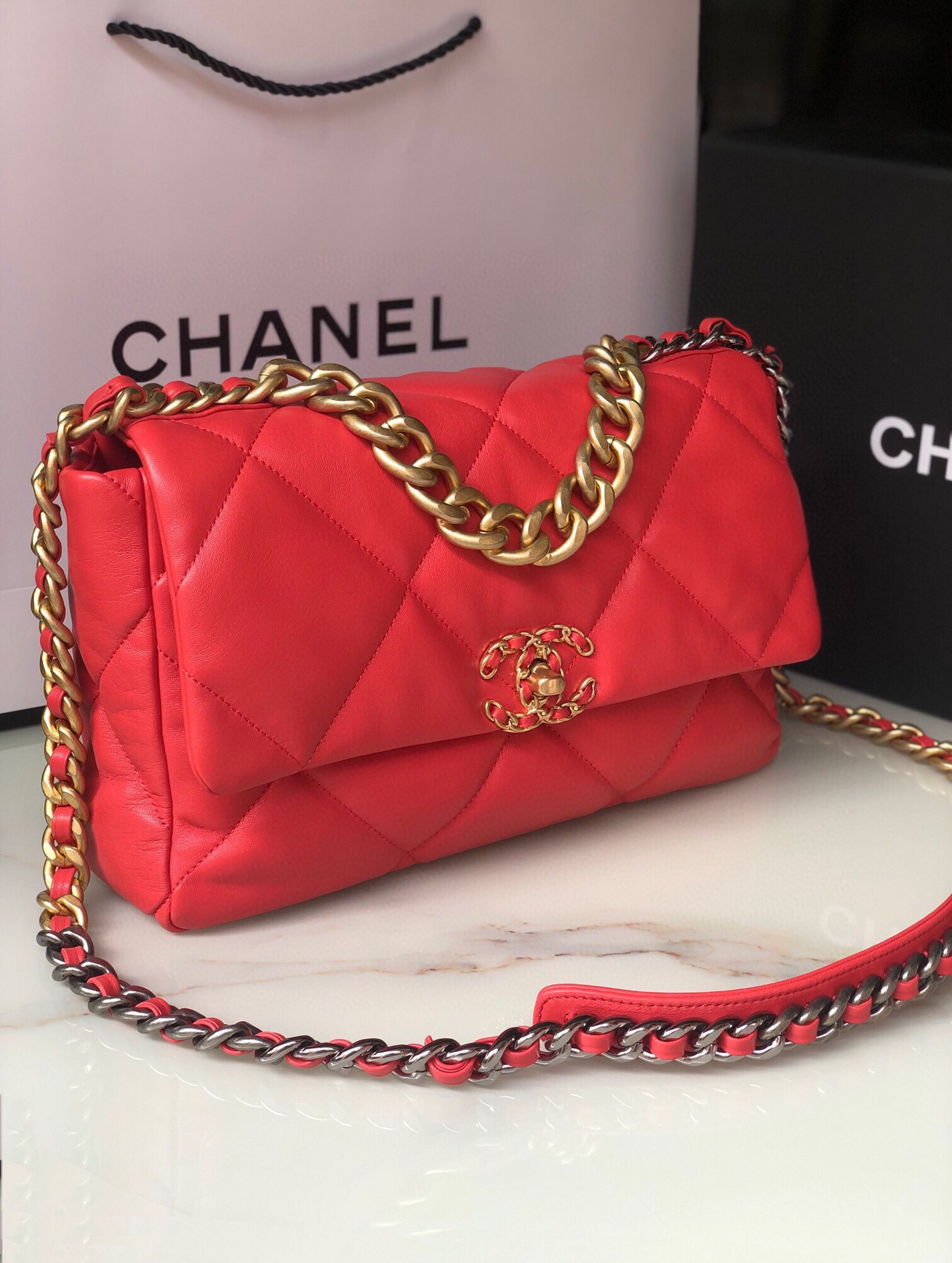 Ch*el 19 large handbag shiny leather red, gold-tone, silver-tone & ruthenium-finish metal 7.8 × 11.7 × 3.9 in