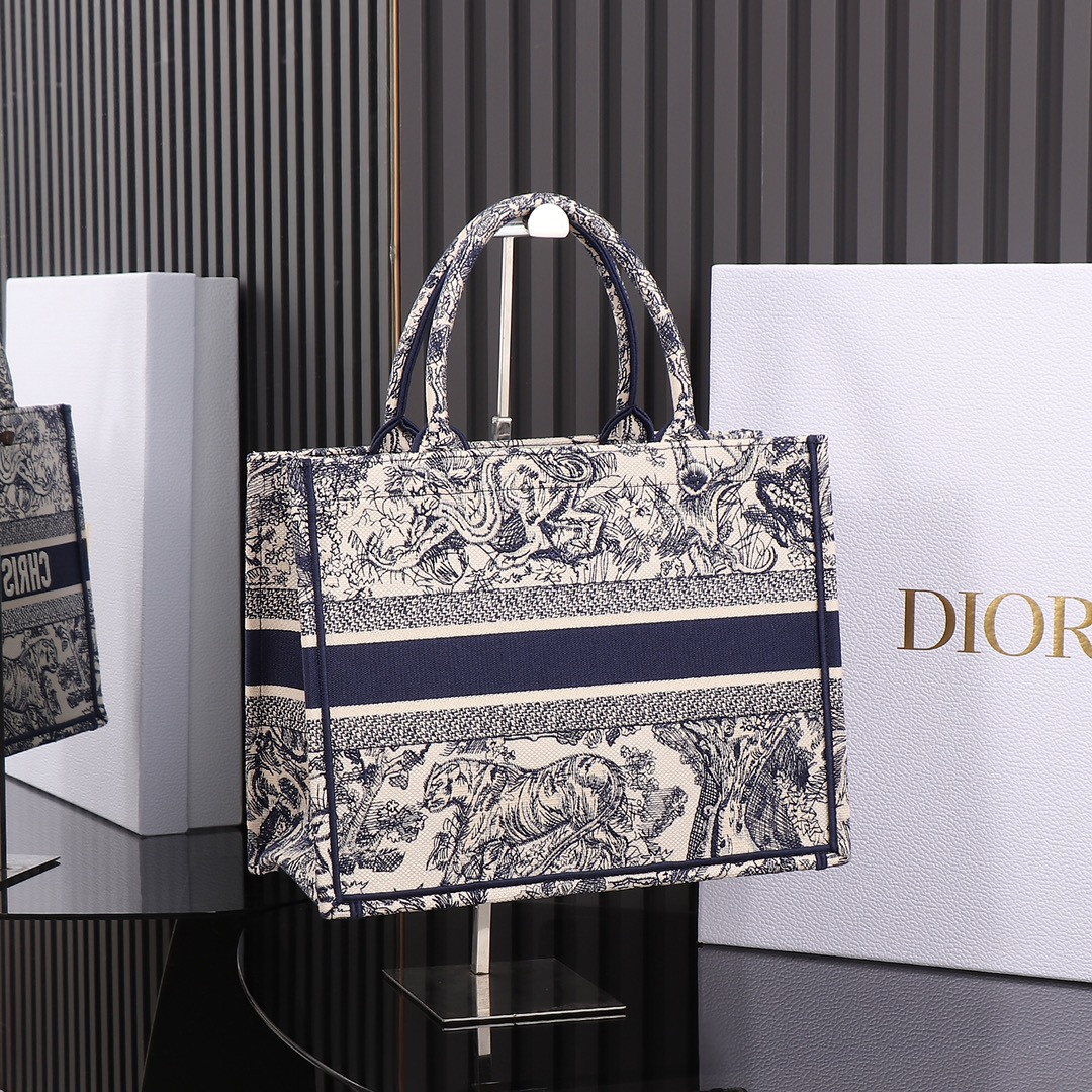 medium D*or book tote  ecru and blue toile de jouy embroidery 14 x 11 x 6.5 inches