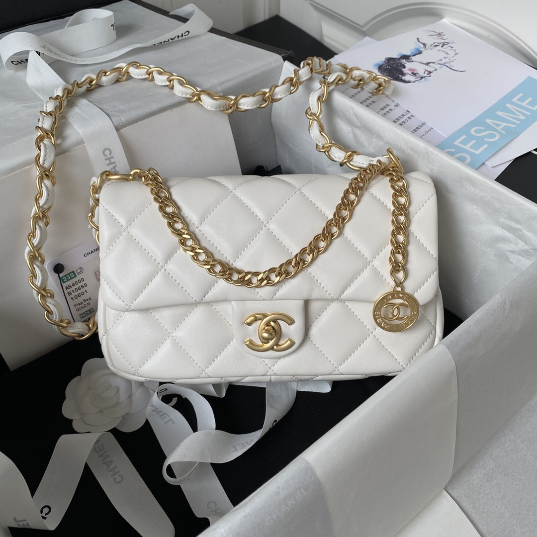 Ch*el small classic handbag grained shiny calfskin & gold-tone metal white 5.7 × 9 × 2.3 in
