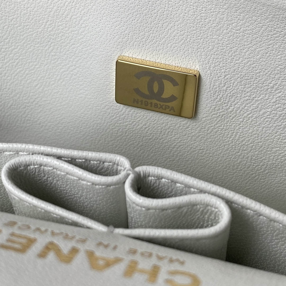 Ch*el small classic handbag grained calfskin & gold-tone metal white 5.7 × 9 × 2.3 in