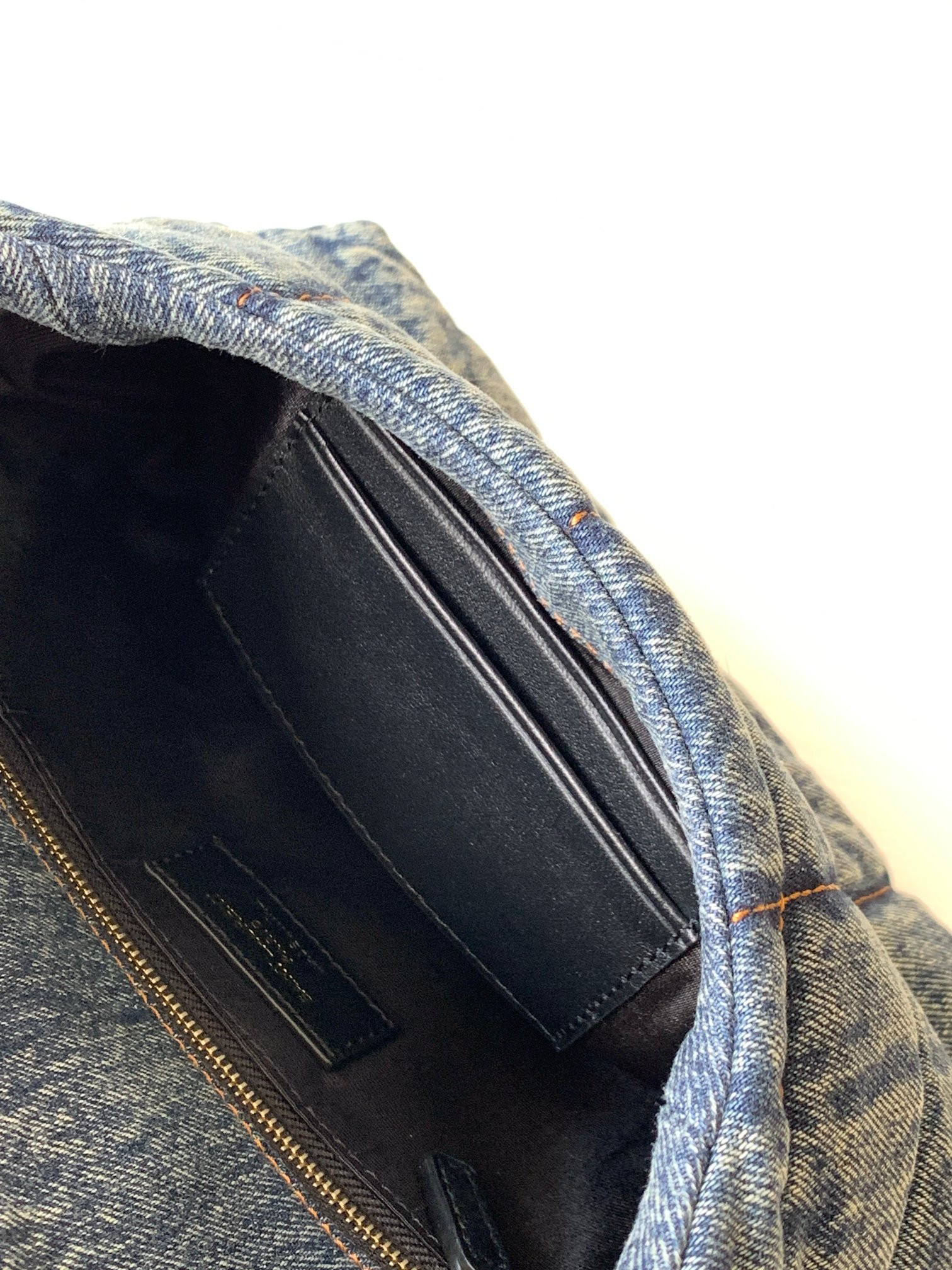 y*l puffer in suede and De*1m rodeo blue 23 x 15.5 x 5.8 cm