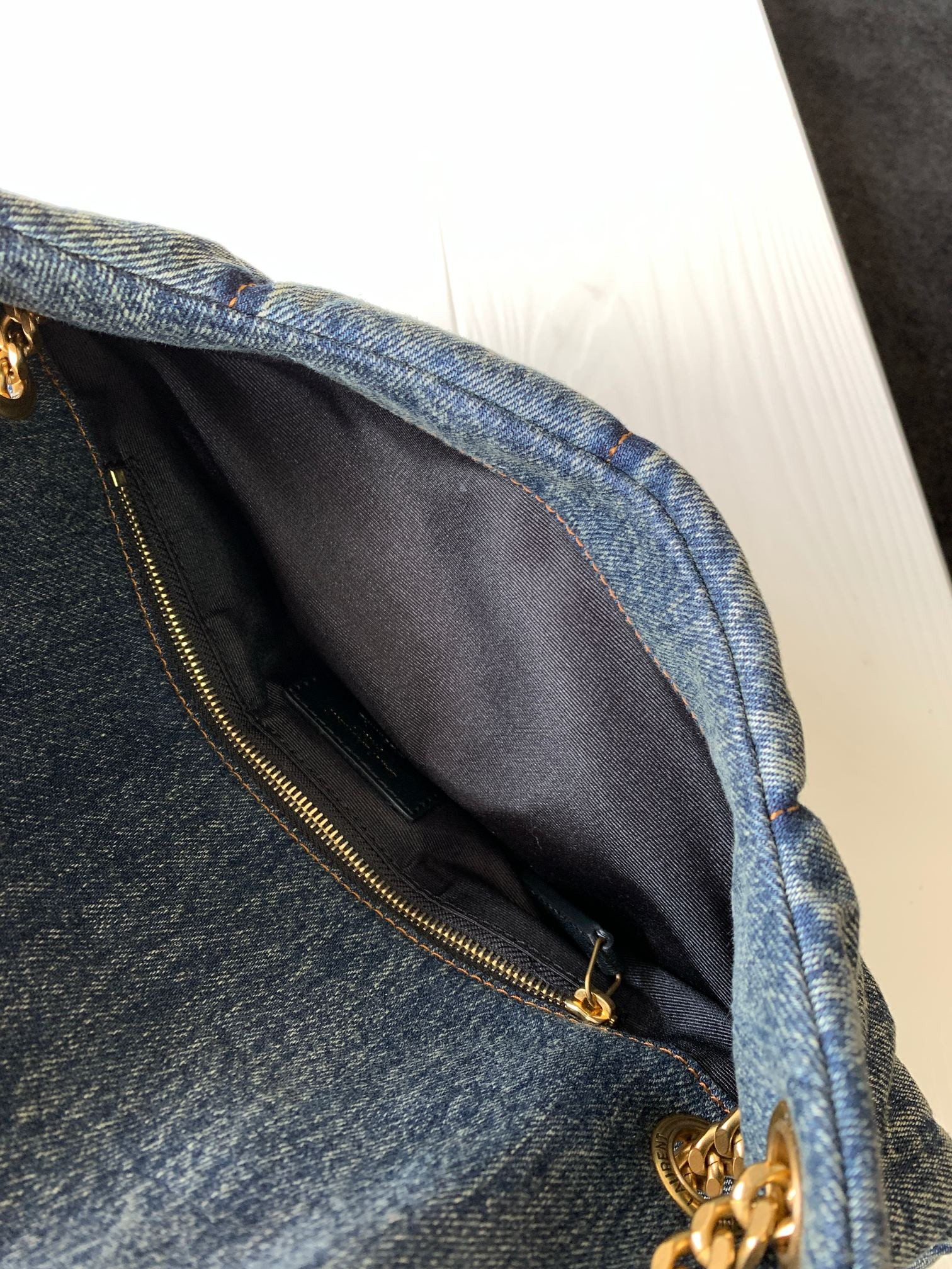y*l puffer small in suede and De*1m rodeo blue 11.4 x 6.6 x 4.3 inches