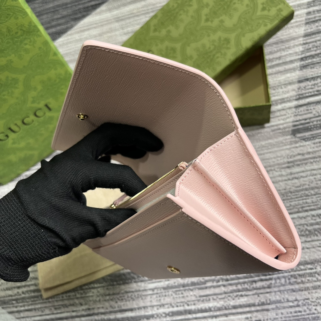 continental wallet with G*u*i script pink 7.5"w x 4"h x 1.4"d