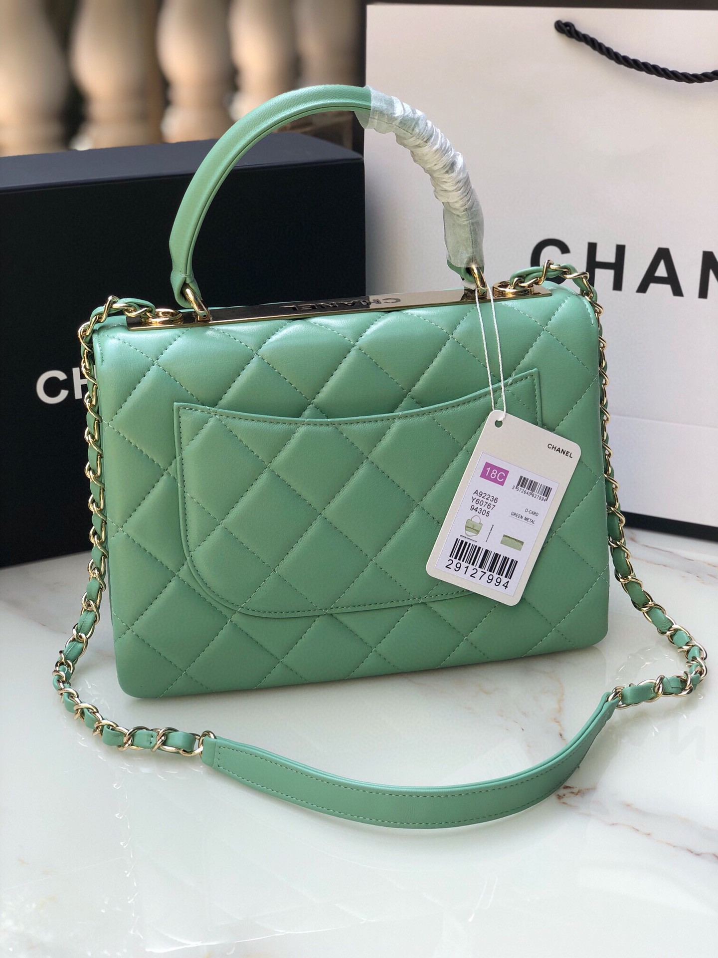 Ch*el flap bag with top handle 6.6 × 9.8 × 4.7 in