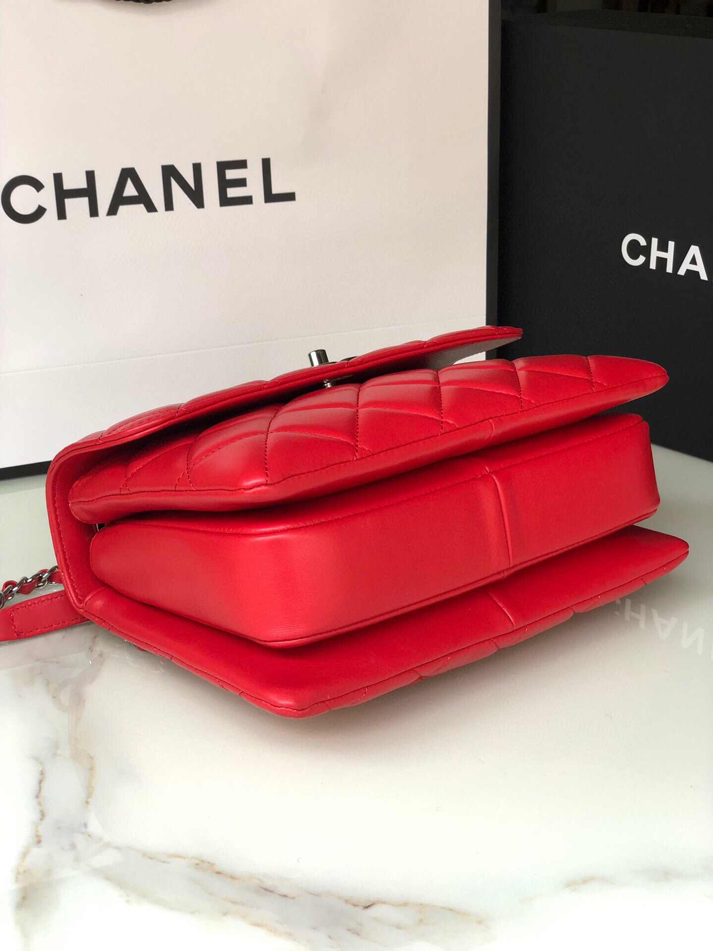Ch*el flap bag with top handle 6.6 × 9.8 × 4.7 in