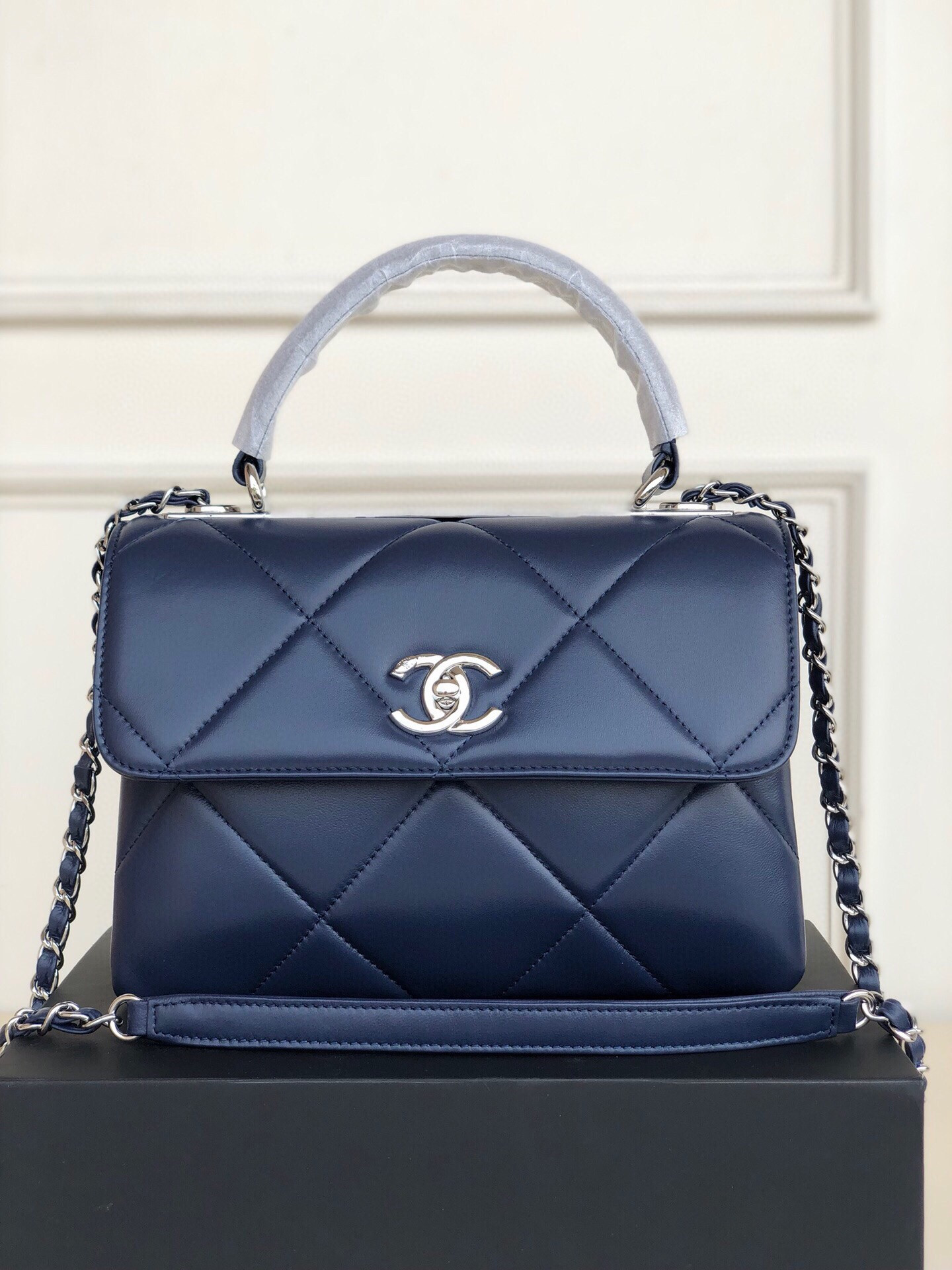 Ch*el flap bag with top handle 6.6 × 9.8 × 4.7 in