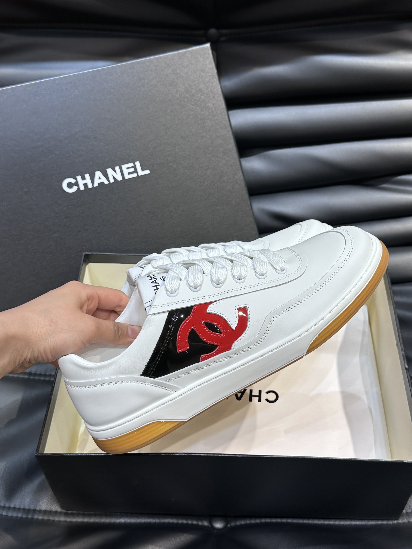 ua Ch*el sneaker calfskin