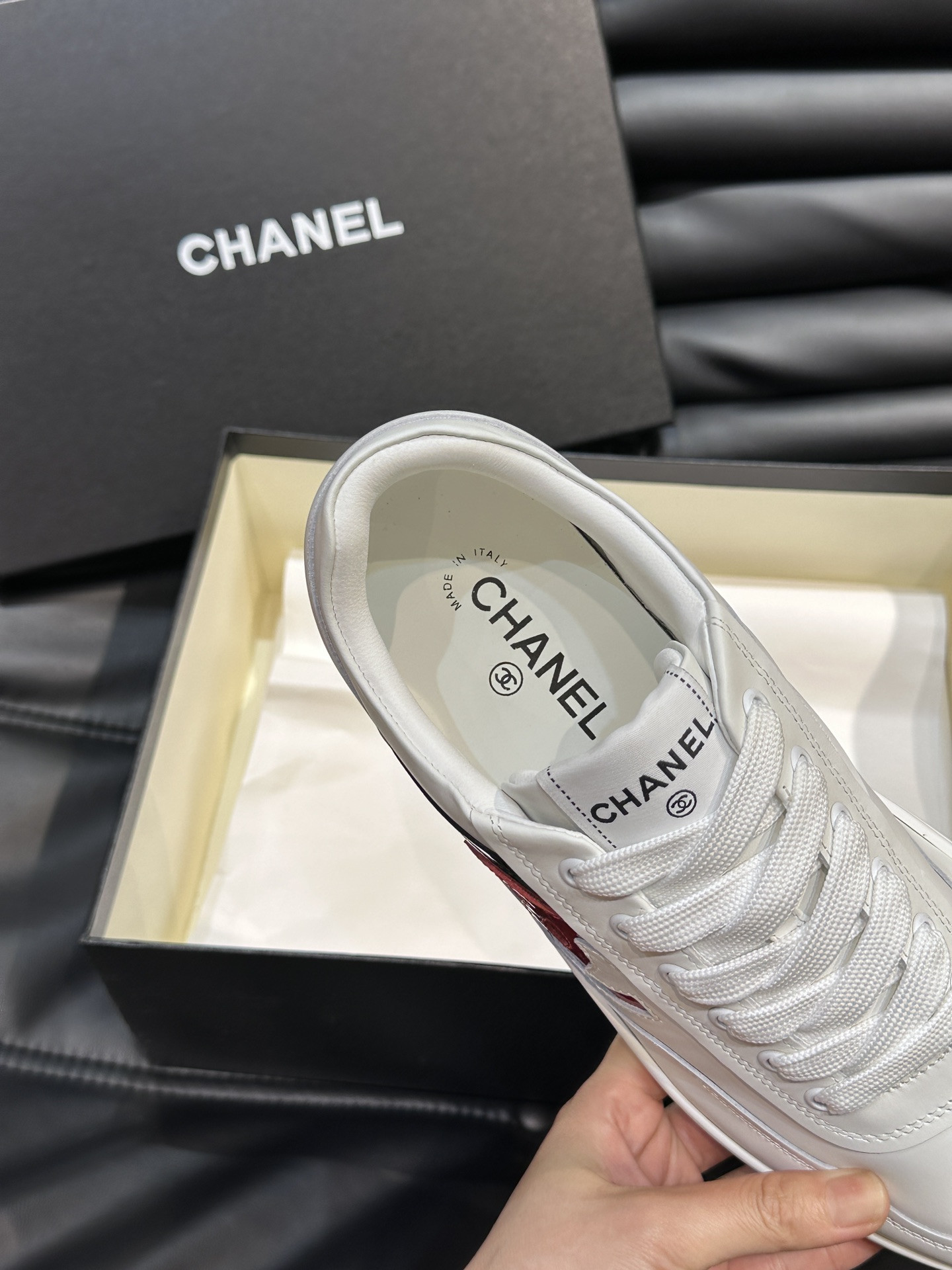 ua Ch*el sneaker calfskin