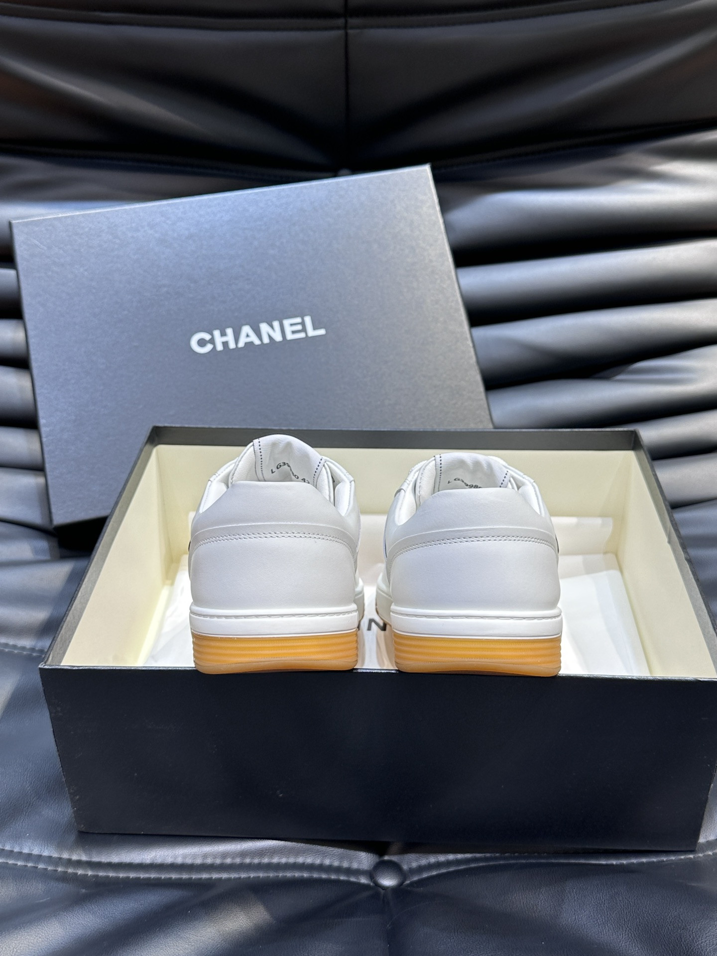 ua Ch*el sneaker calfskin