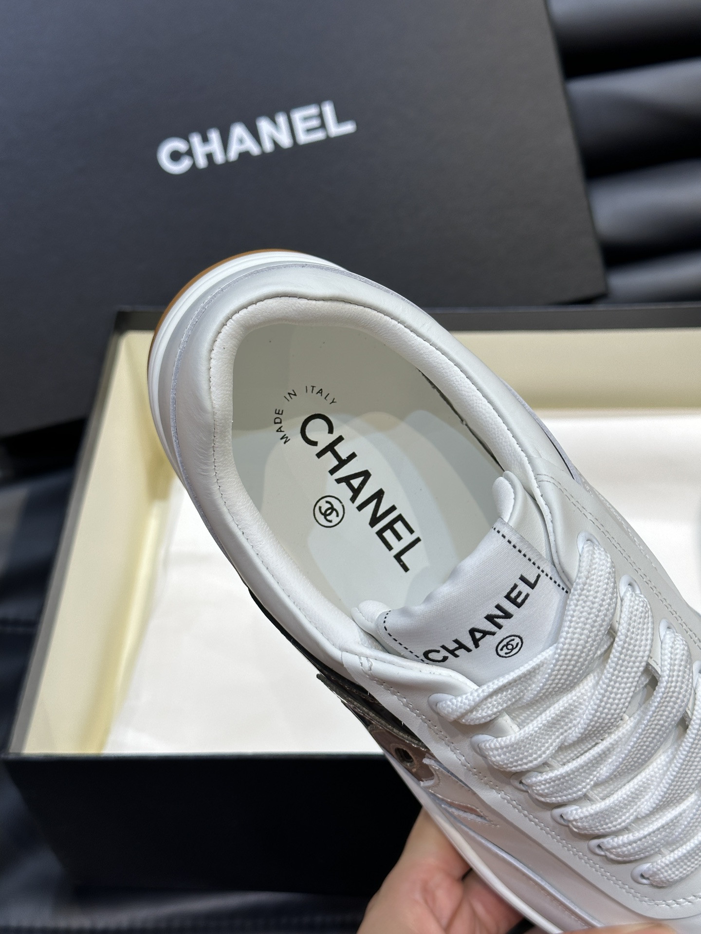 ua Ch*el sneaker calfskin