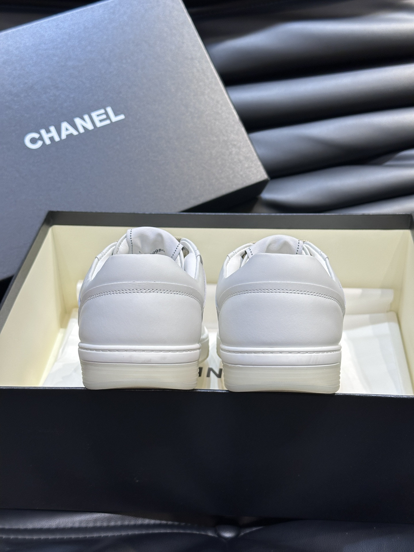 ua Ch*el sneaker calfskin