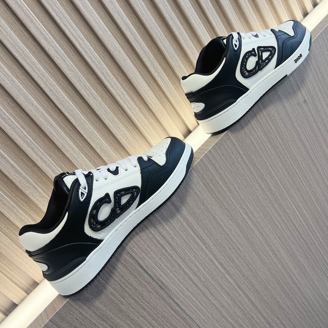 ua D*or b57 low-top sneaker black and white