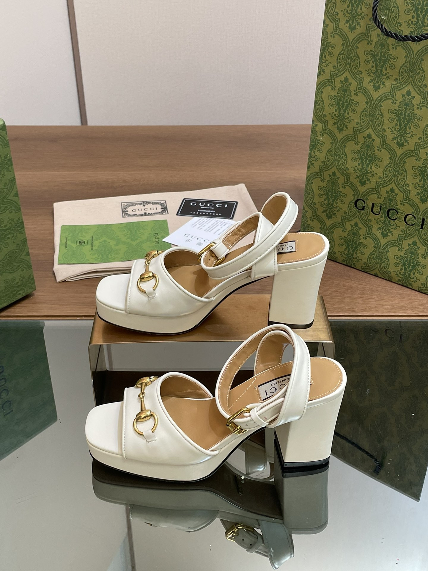 ua G*u*i horsebit platform sandal