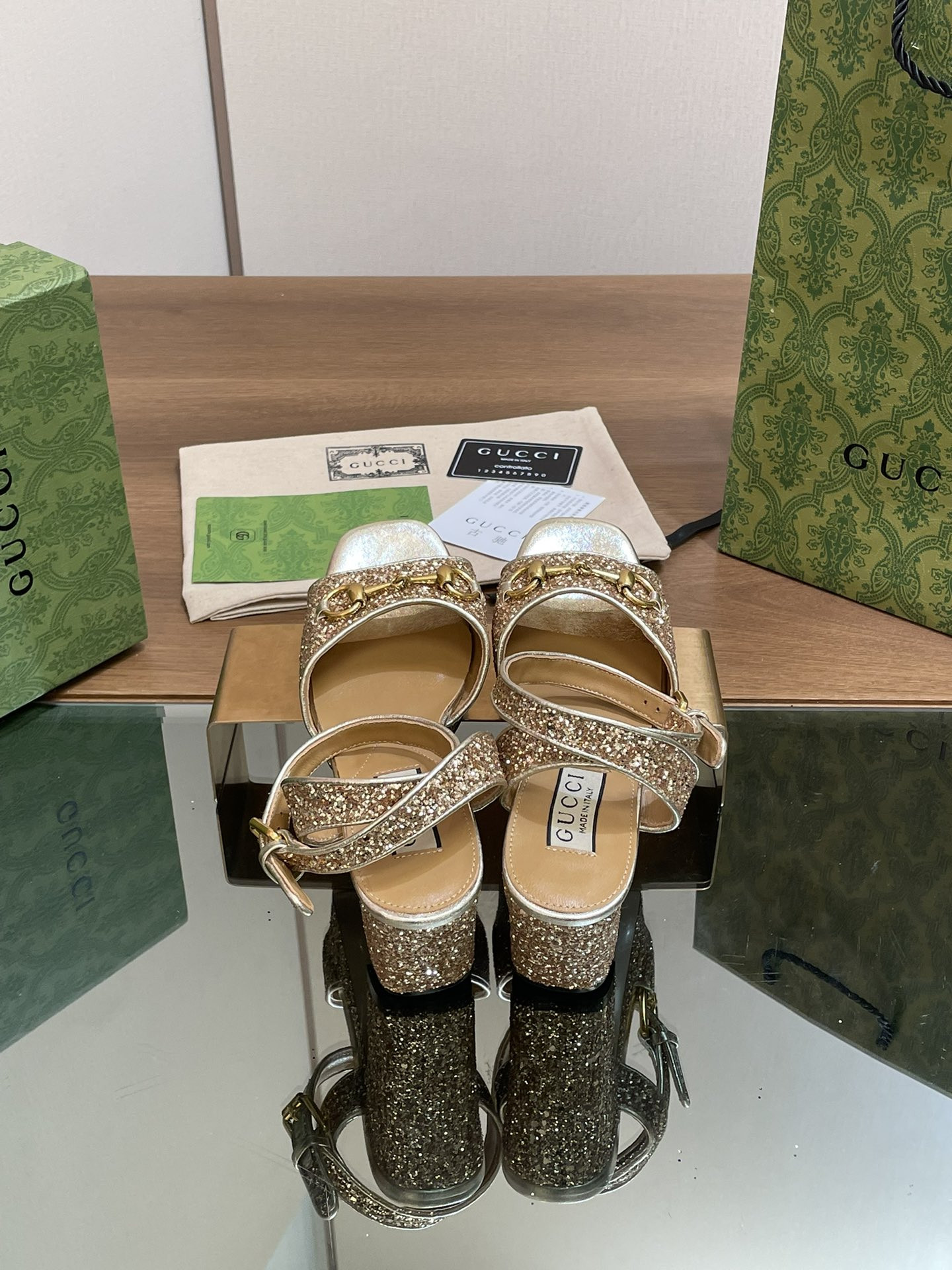 ua G*u*i horsebit platform sandal