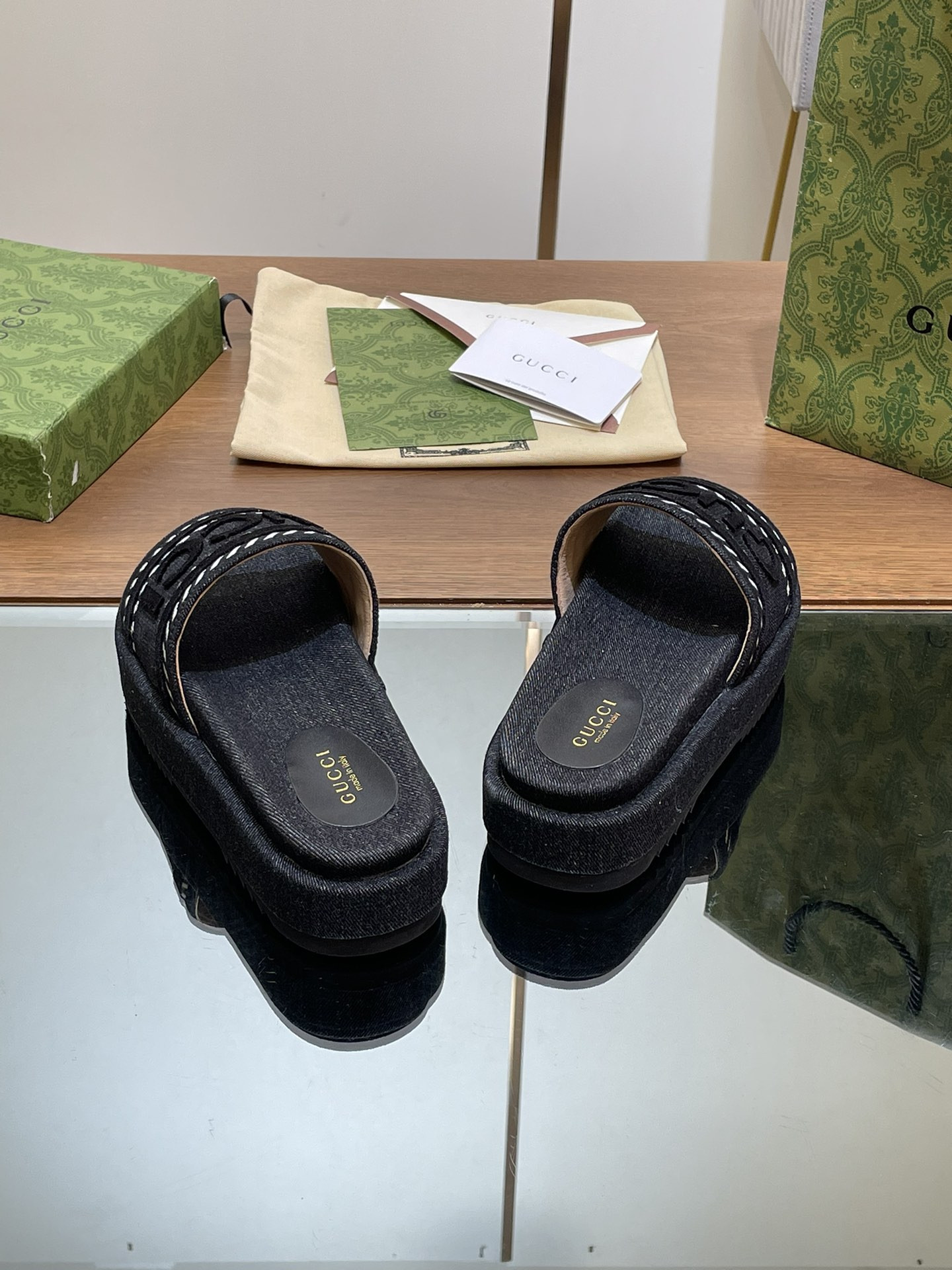ua G*u*i slide sandal with G*u*i script