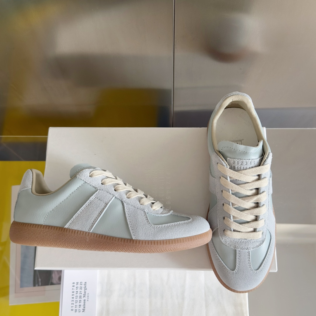 ua ma*s*n Ma*i*la mm6 sneakers