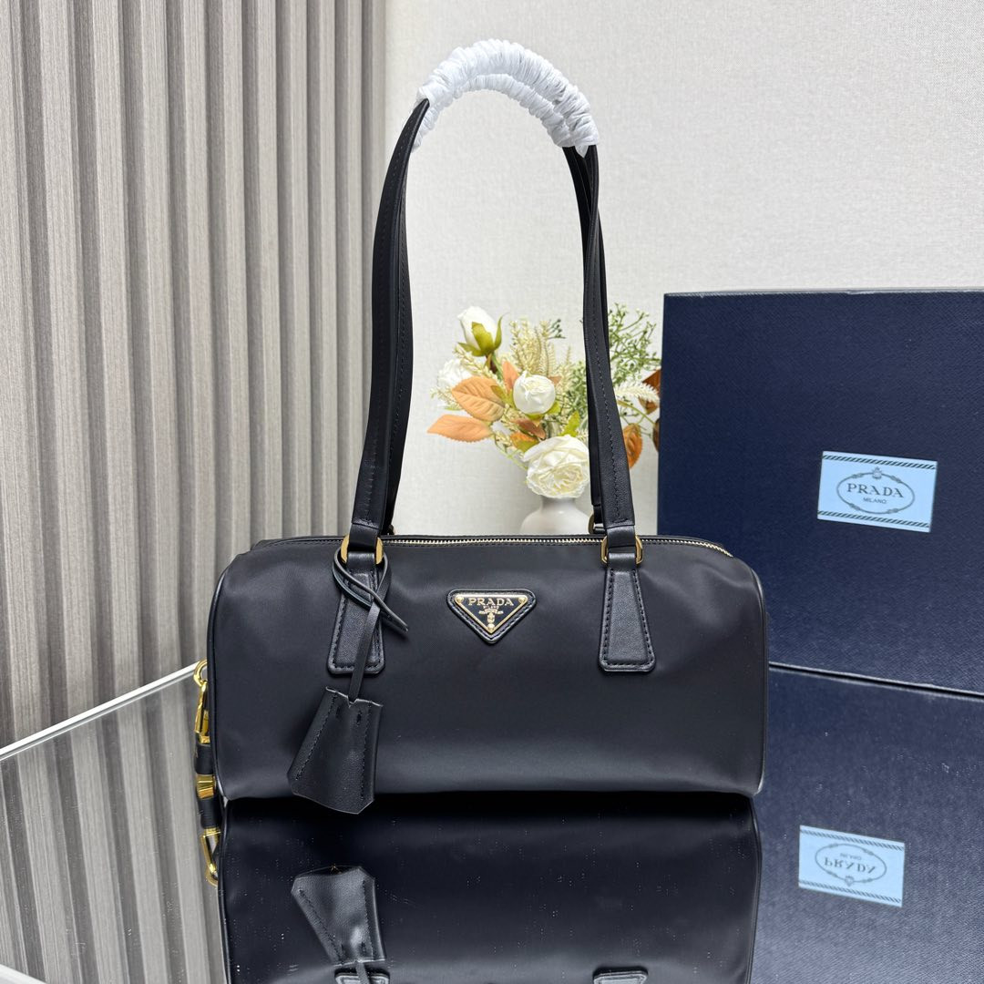 Pra*a re-nylon and leather medium top-handle bag with padlock 12.5x29x10cm